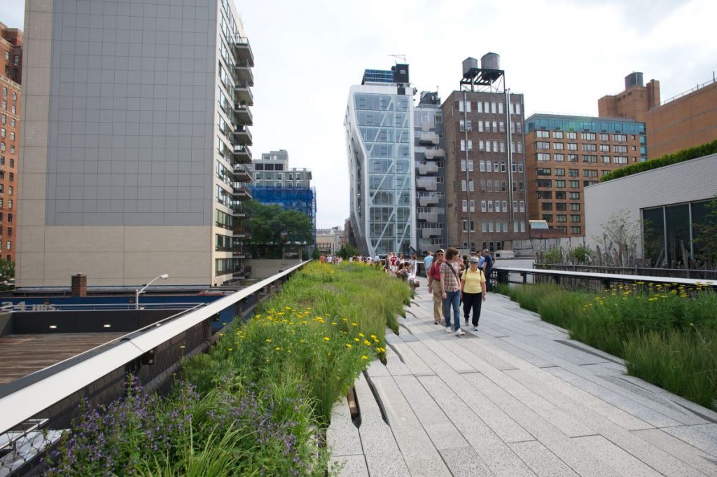 People walking along the High Line park. 