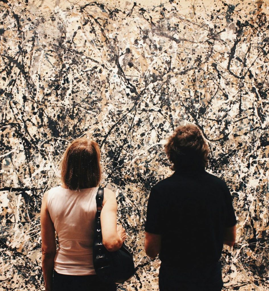 Two people looking at art at Modern Art Museum in New York 