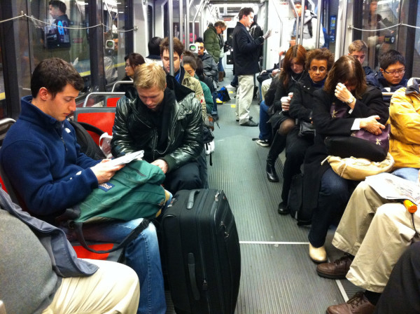 Commuters on a New York Subway. | Photo by David Lytle https://www.flickr.com/photos/dlytle/5456629867/in/photolist-4QCxKX-818fjH-818fr8-81bpAC-9jbDXi-acYk5t