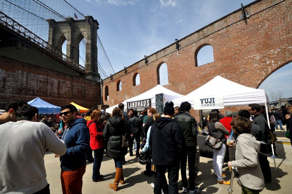 people hanging out at Smorgasburg in New York City. 