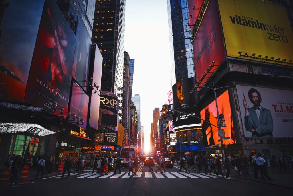 People walking around downtown in New York City