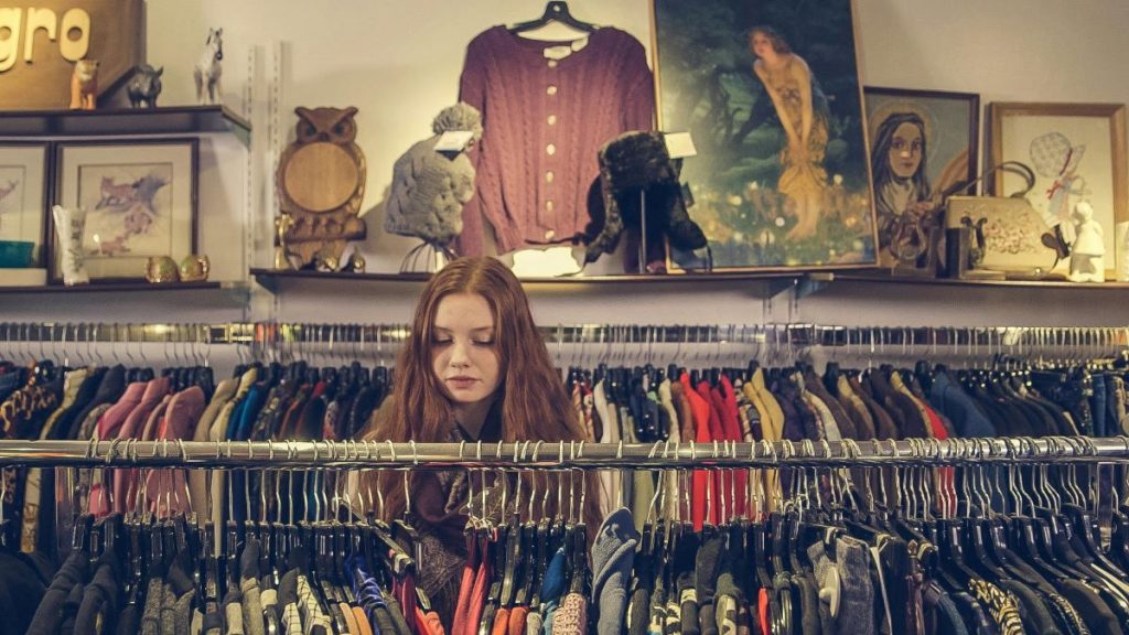 A woman thrifting and shopping in NYC