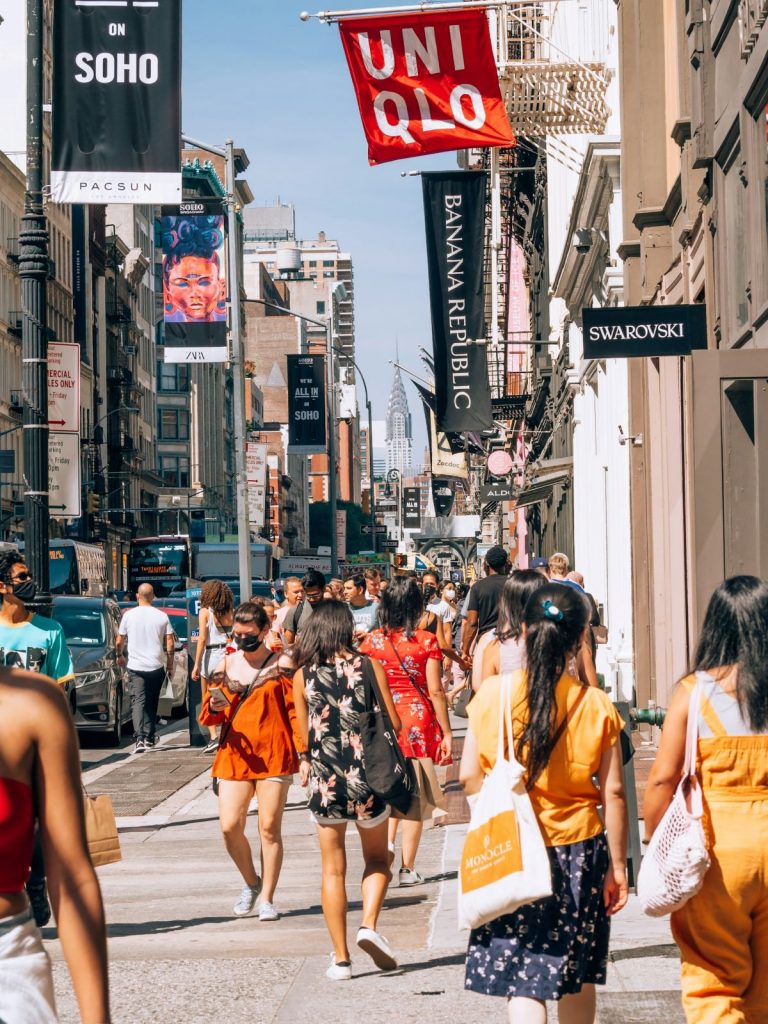 People walking down the street shopping in SoHo