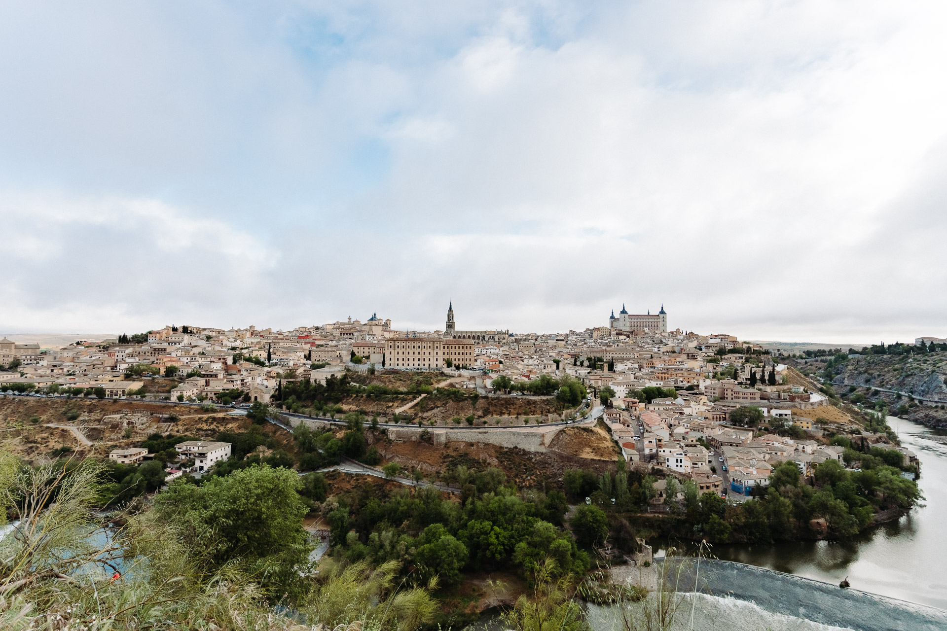 Toledo city center viewpoint with the Tagus River, cathedral, and other buildings