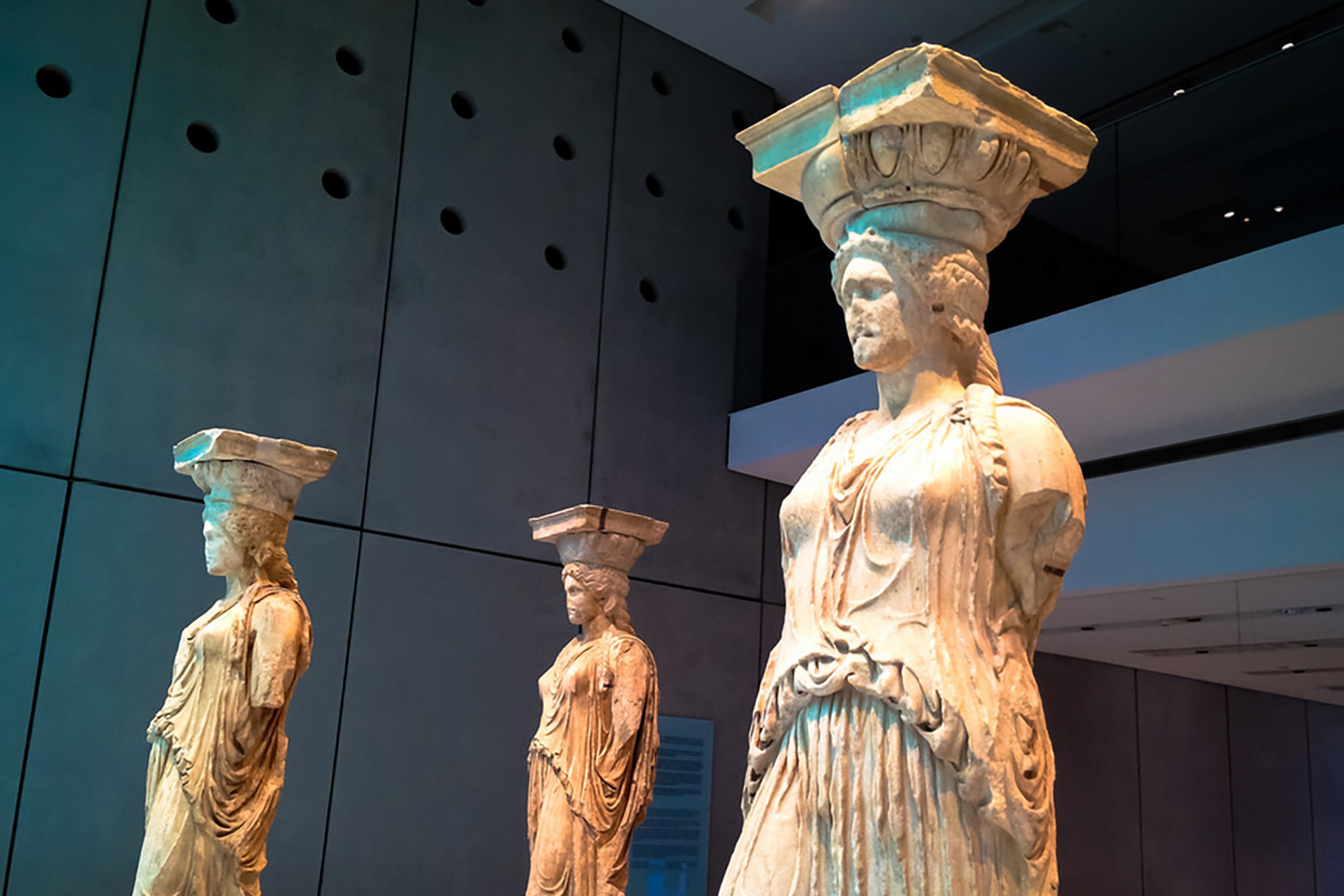 Statues of women in the New Acropolis Museum in Athens, Greece.