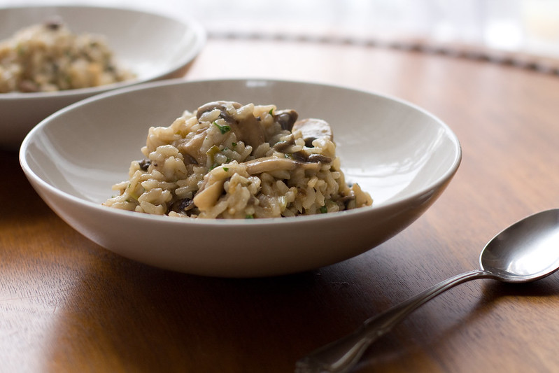 Two bowls of mushroom risotto