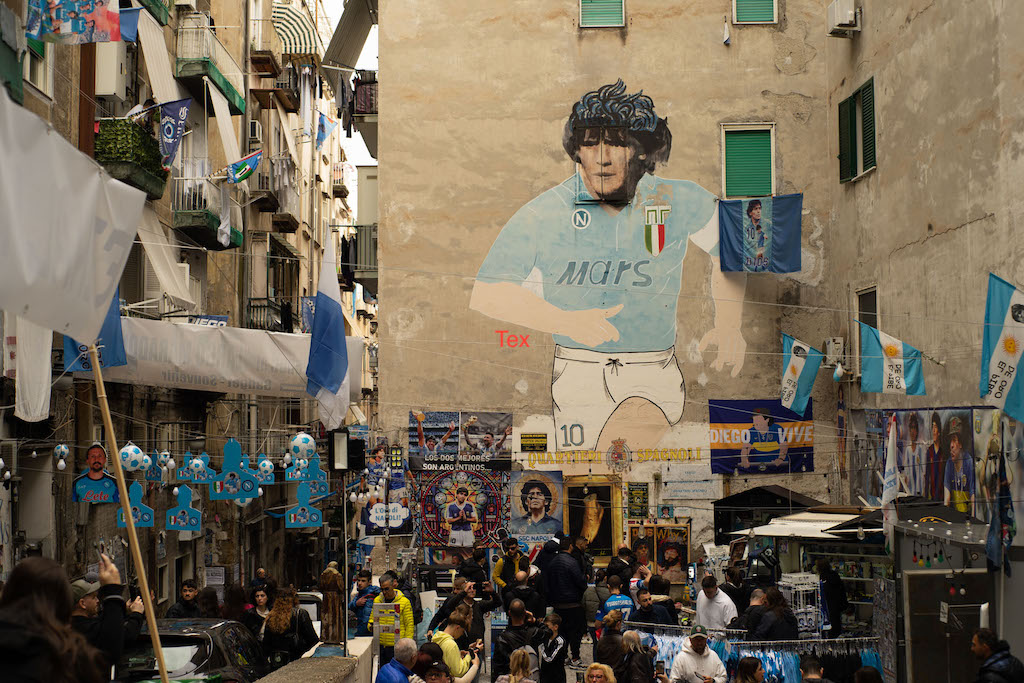 Naples street art with Diego Maradona, an Argentine footballer who played with the club from 1984 to 1992.