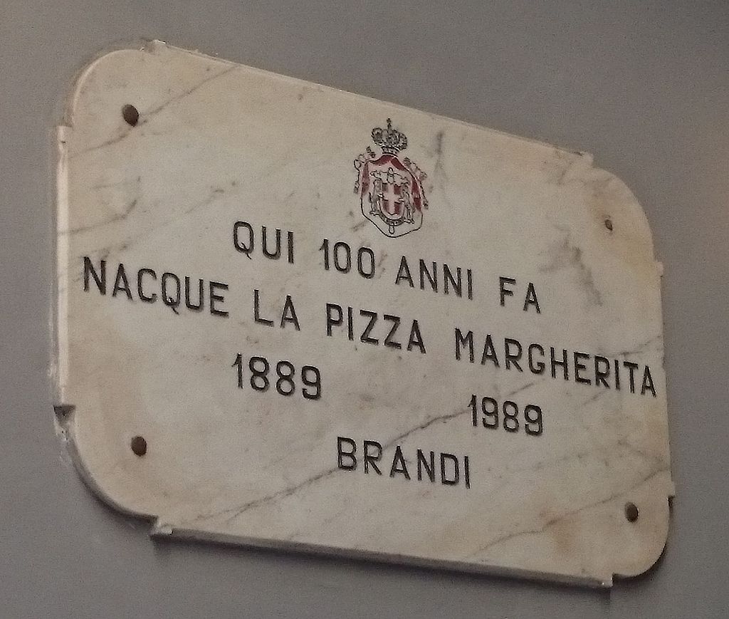 Plaque in Naples announcing the birth of margherita pizza in 1889
