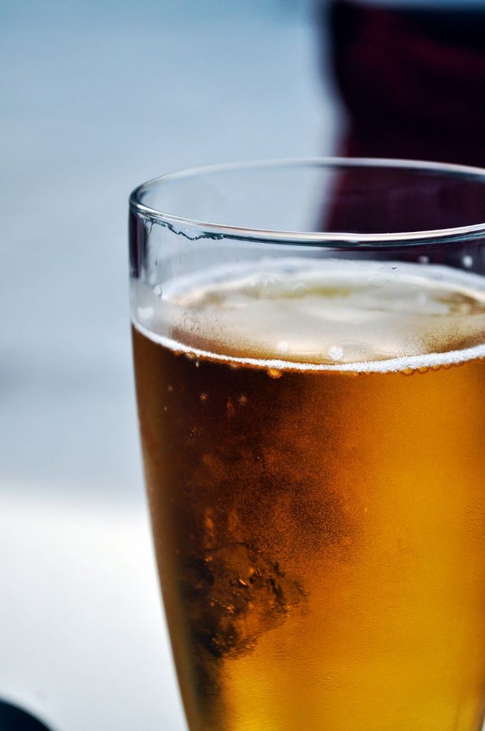 An up-close view of a glass of beer