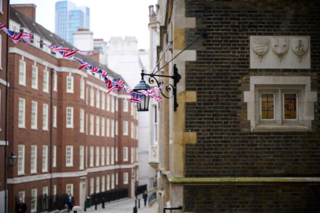 View of street in London with small British flags blowing in the wind