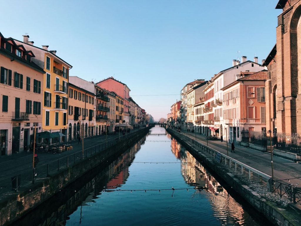 A canal with buildings on a sunny day