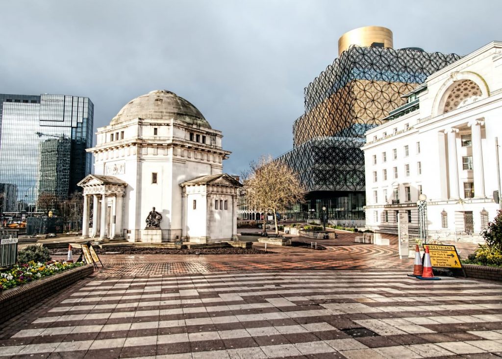 A view of a roundabout and buildings in downtonw Birmingham, UK