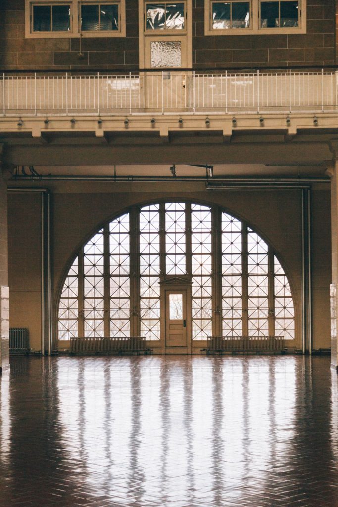 A door with light inside Ellis Island