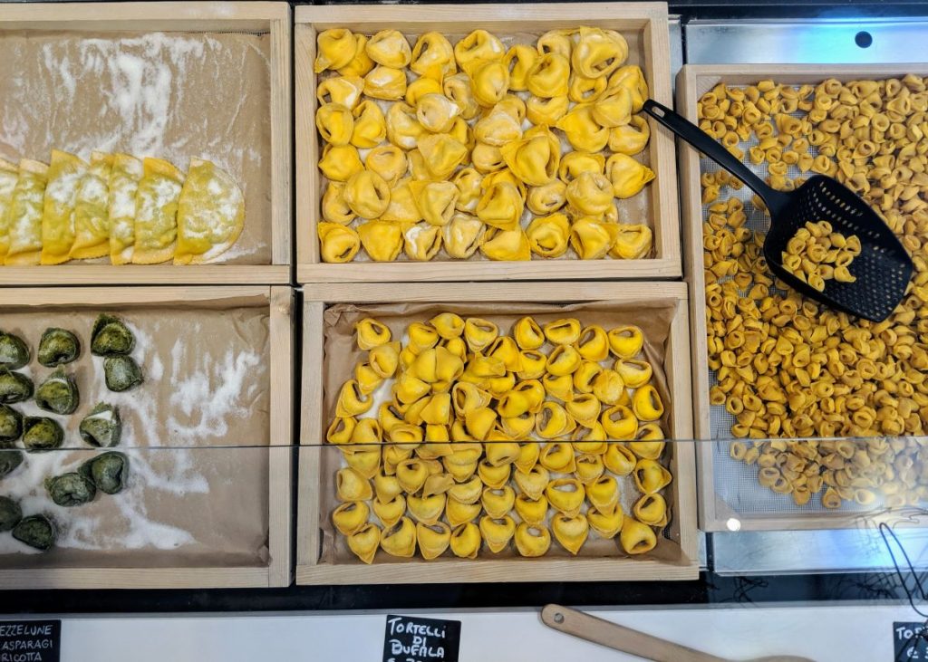 Tortellini and ravioli in containers