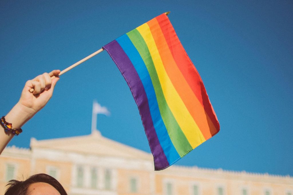 multicolored striped flag waving in the air