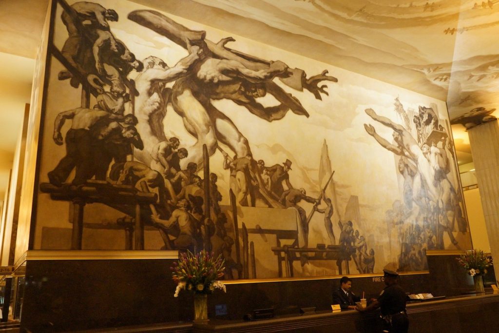 interior rockefeller building mural and reception