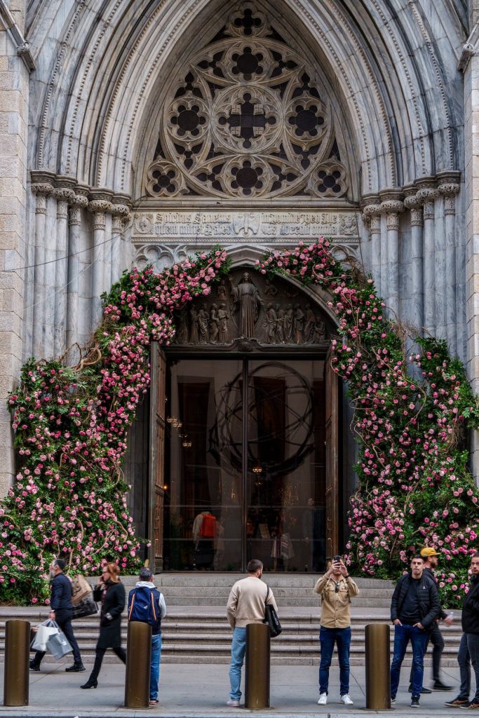 St Patrick's Cathedral entrance flowers people day