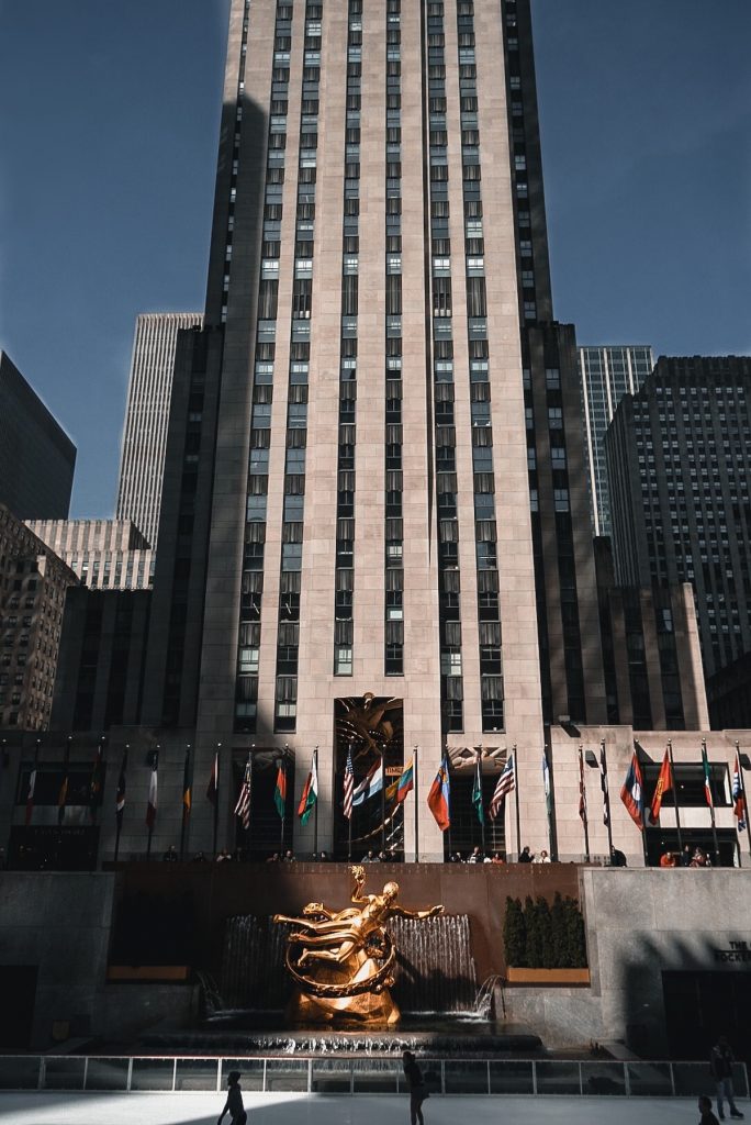 rockefeller center gray concrete building day sculpture