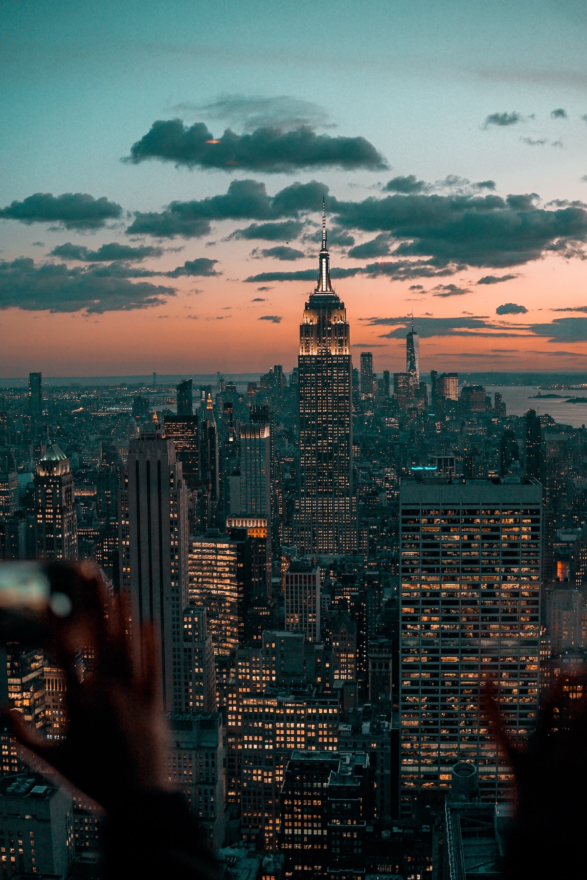 Empire State Building during sunset on a cloudy day