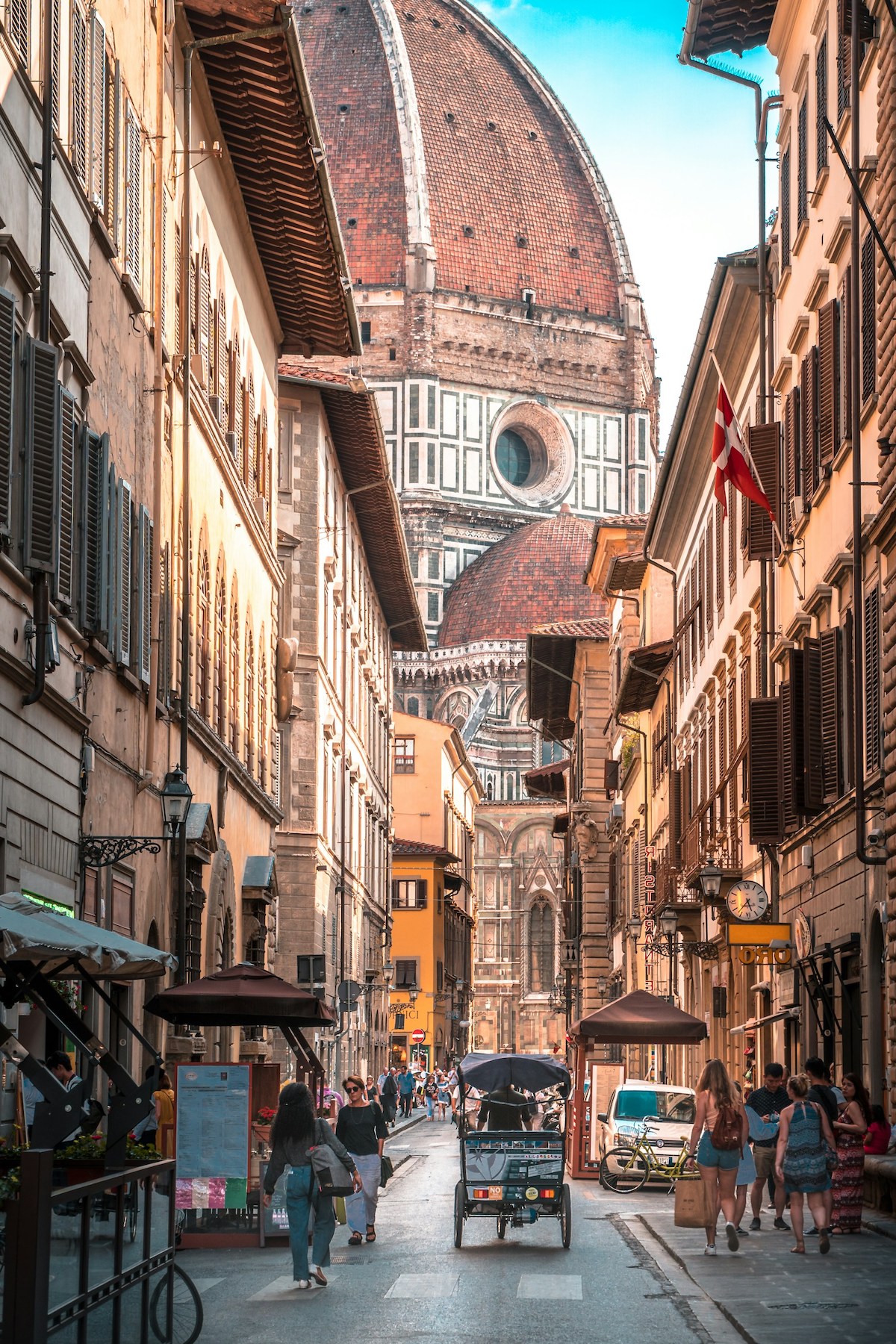 Views of Santa Maria del Fiore from a street in Florence filled with tastes and traditions
