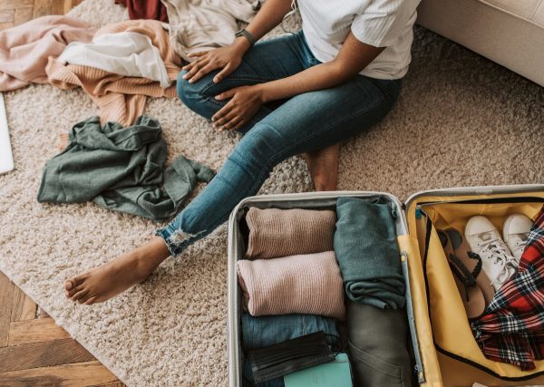 Person packing luggage