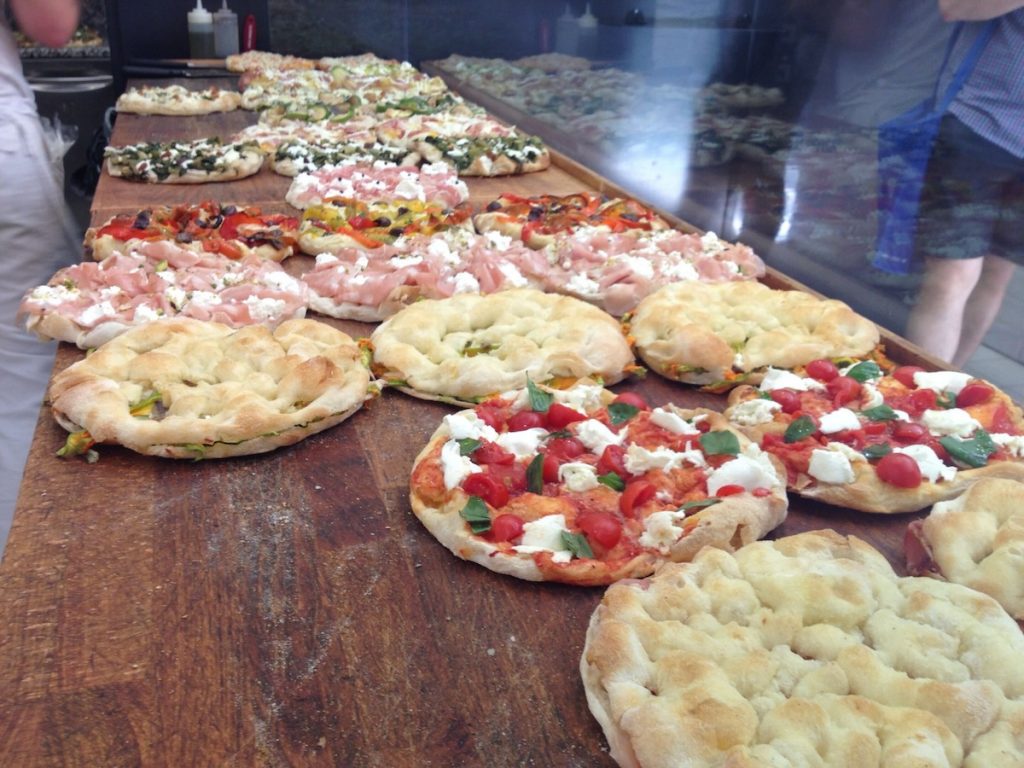 little small pizzas with various toppings