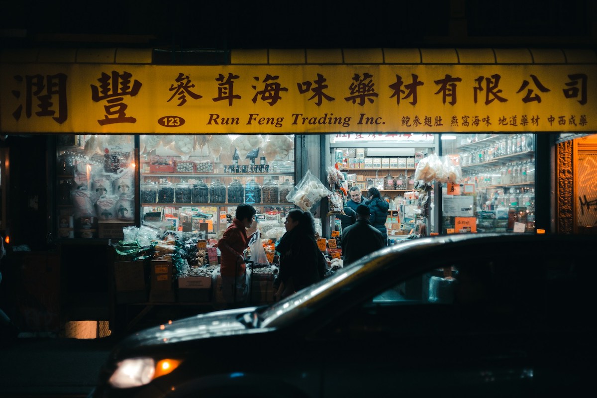 Shops selling clothes and luxury brands in Chinatown NYC