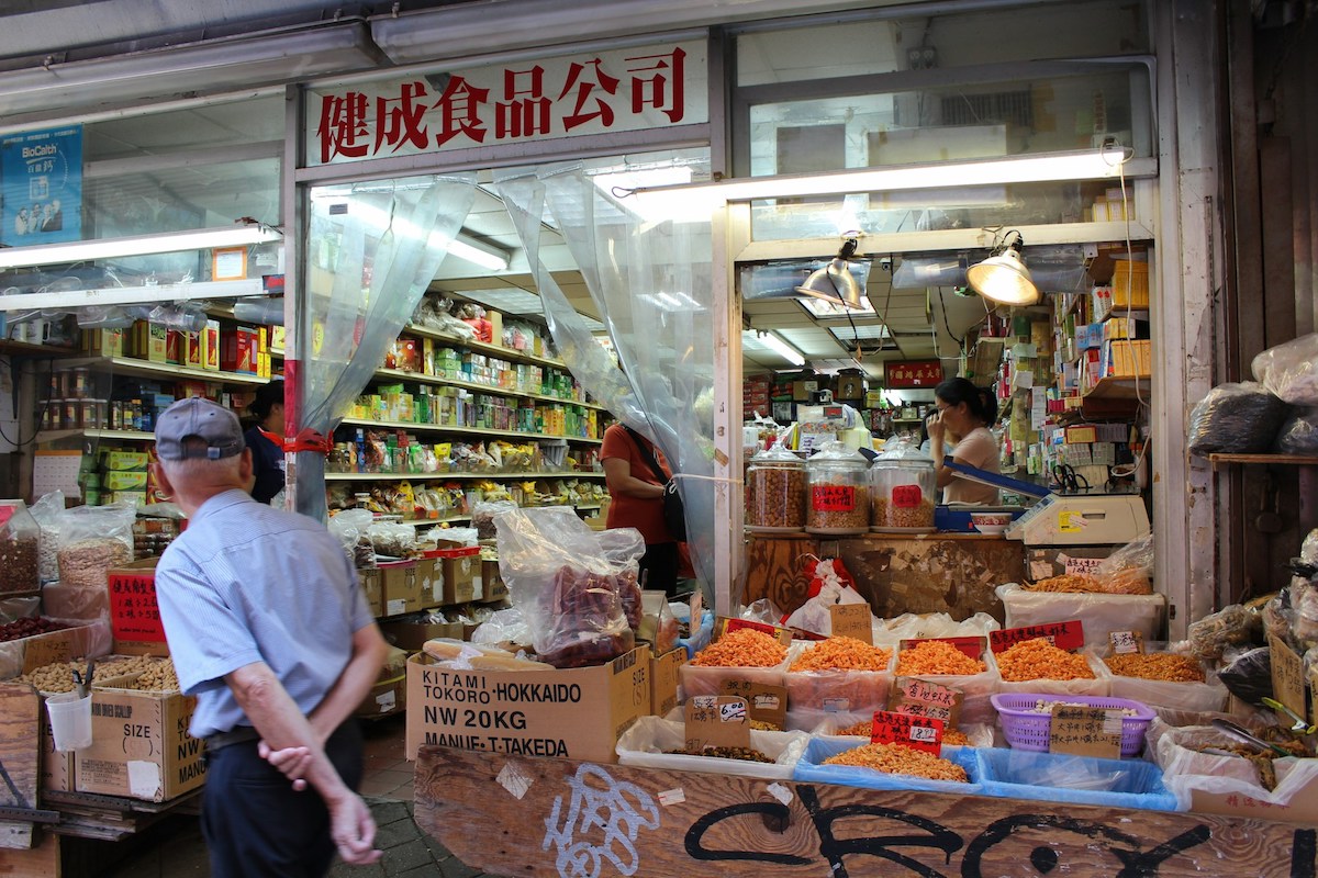 Man walking in Chinatown NYC