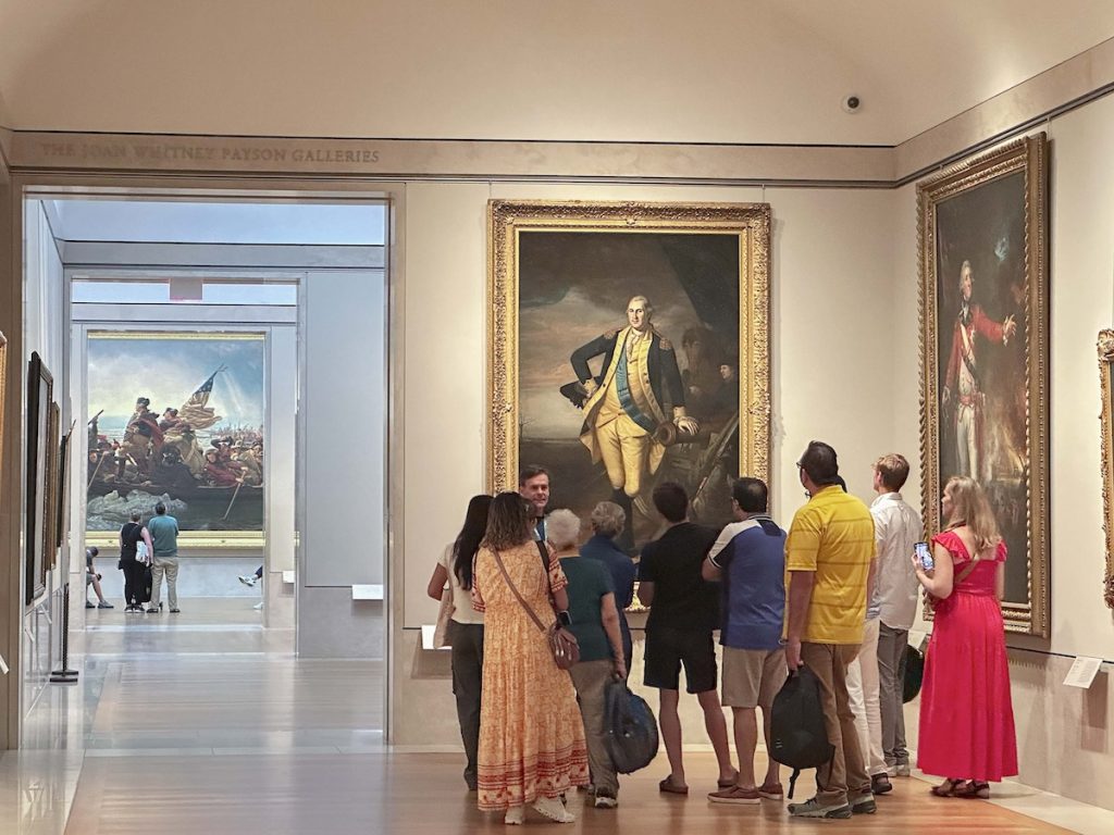 guide with group at the met