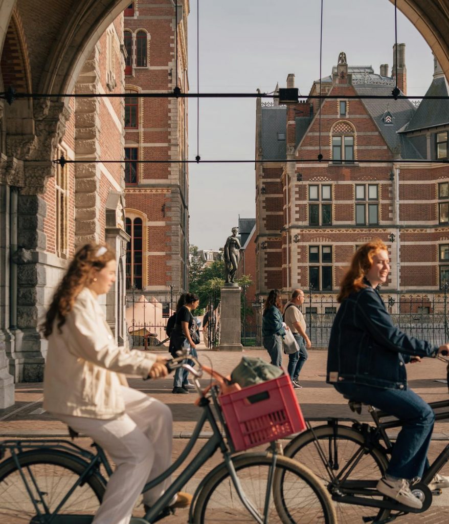 People riding around on bikes in Amsterdam.
