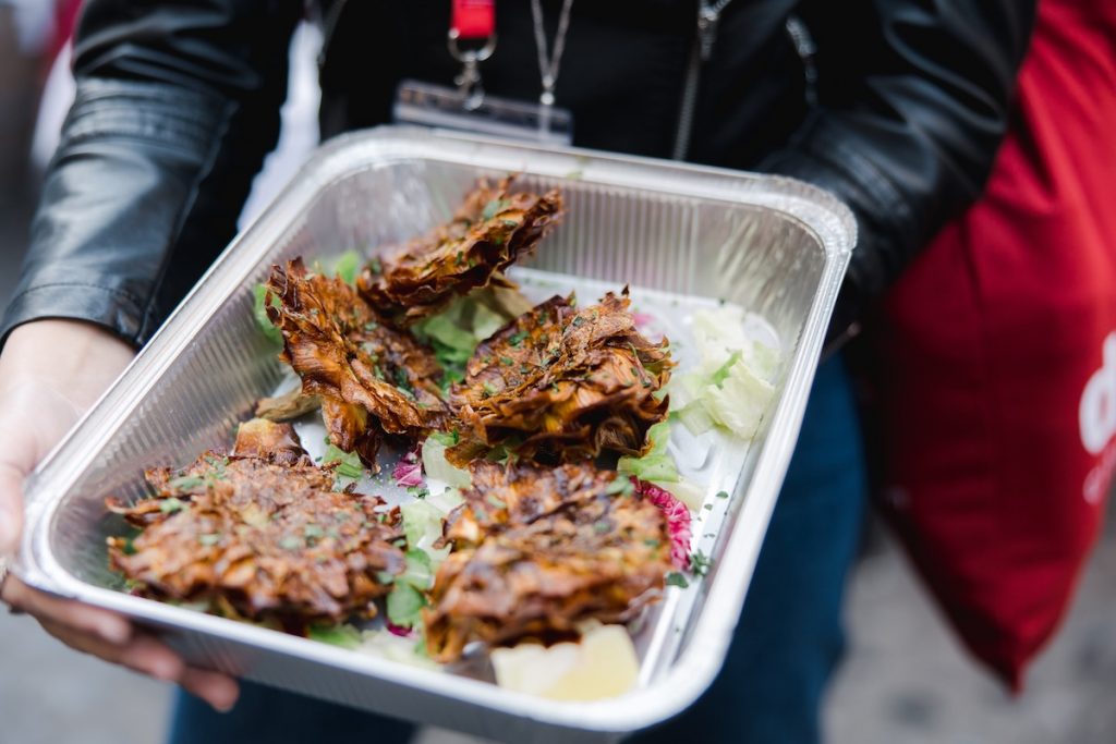 a tray filled with fried artichokes