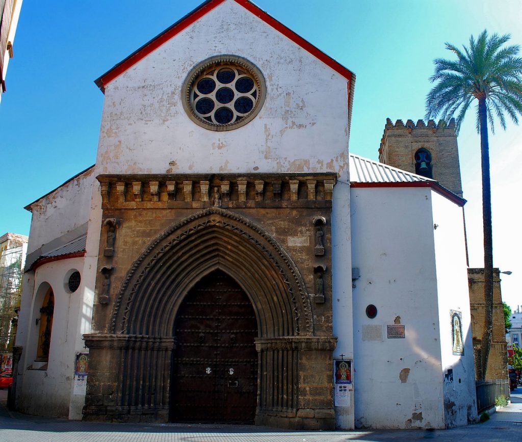 a church in Seville with a big arched door