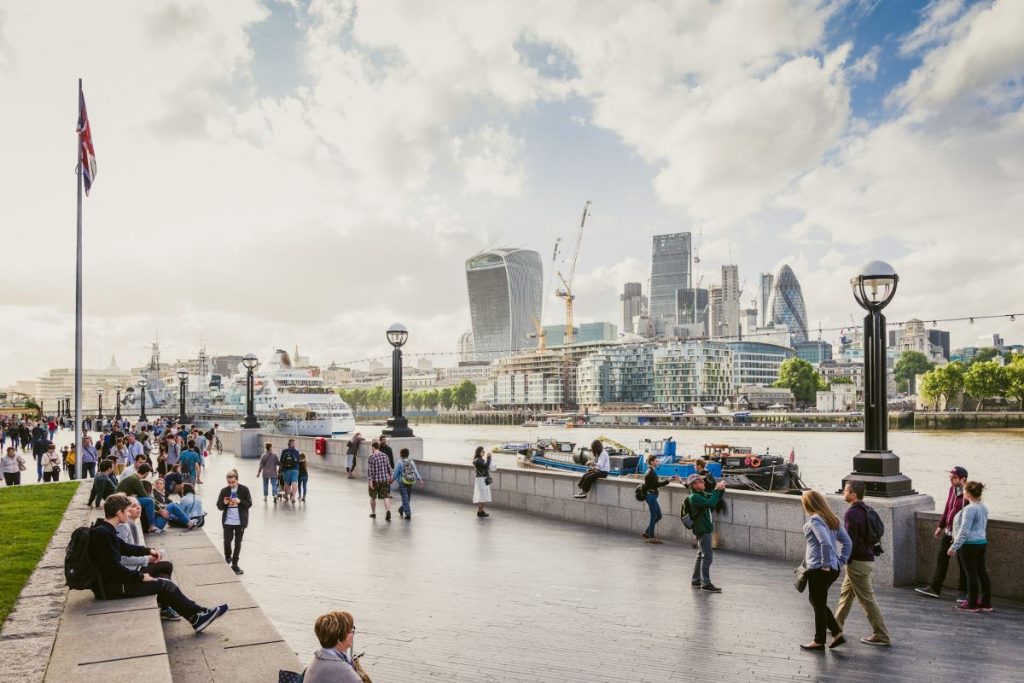 People walking around and exploring London on a budget. 