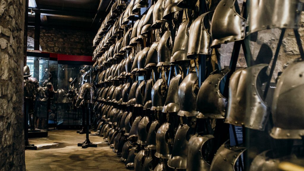 A row of different pieces of armor inside the Tower of London