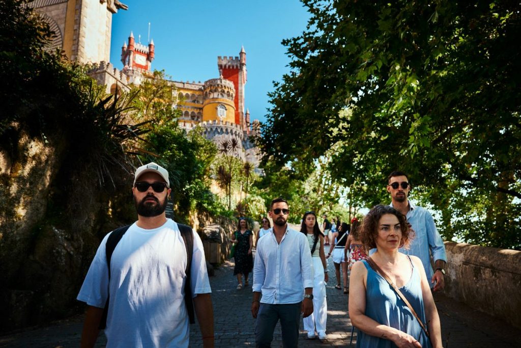 People in Sintra walking towards Quinta da Regaleira.